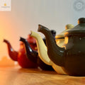 Théière orientale de métal émaillé